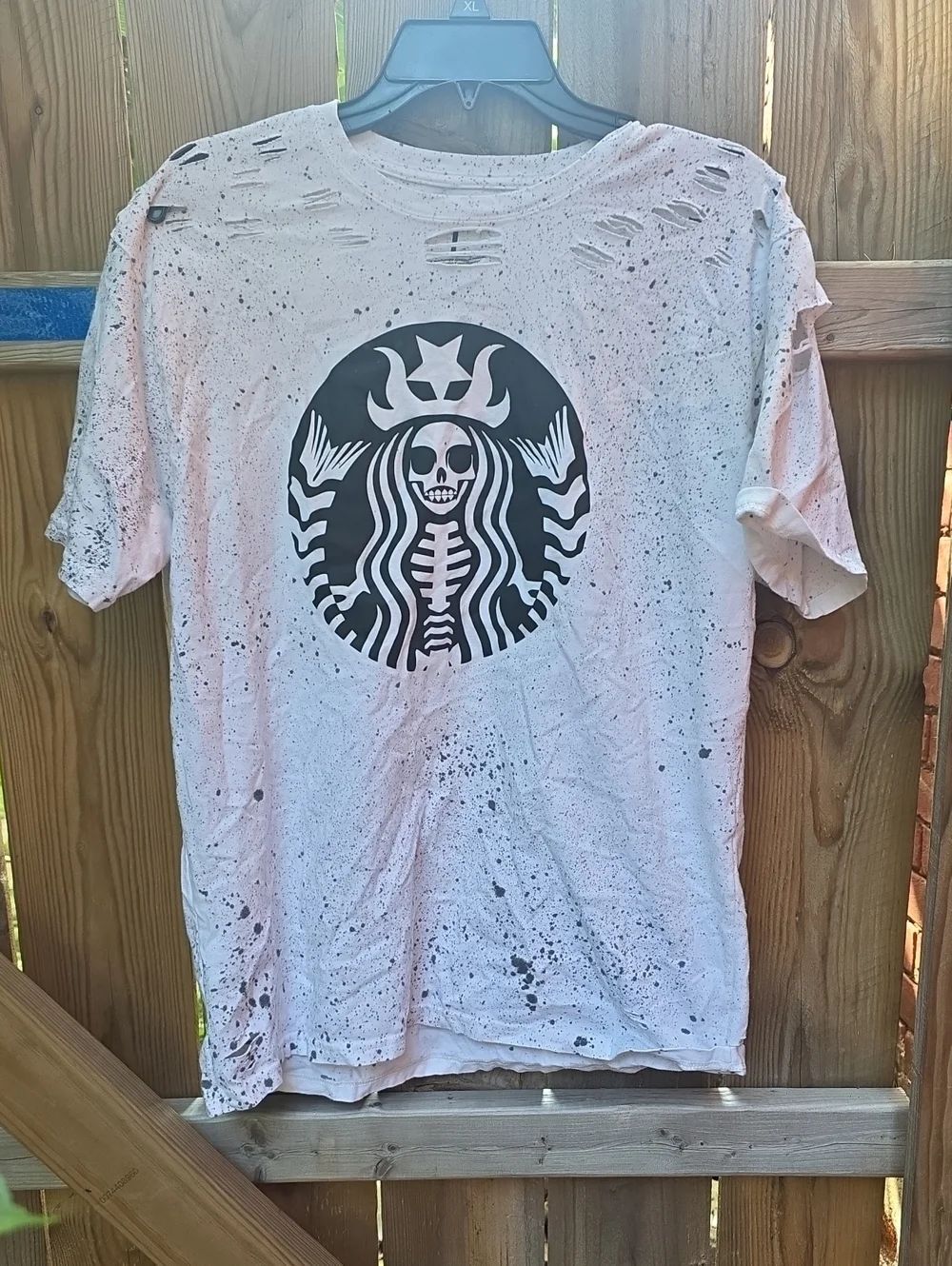 Distressed Pink Graphic Tee with Black Skull Mermaid Logo